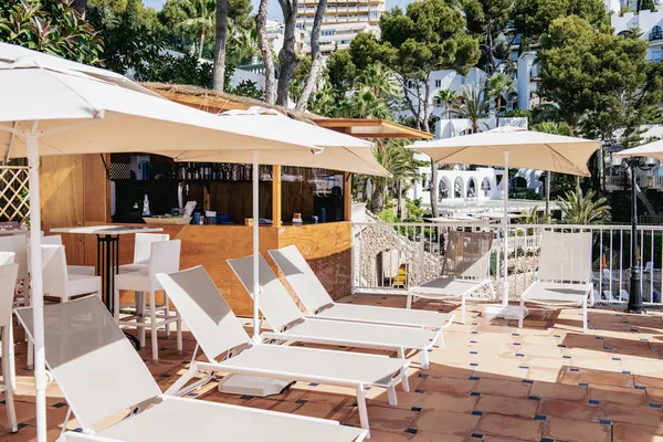 Sunbeds at the beach bar of ROC Illetas & Spa